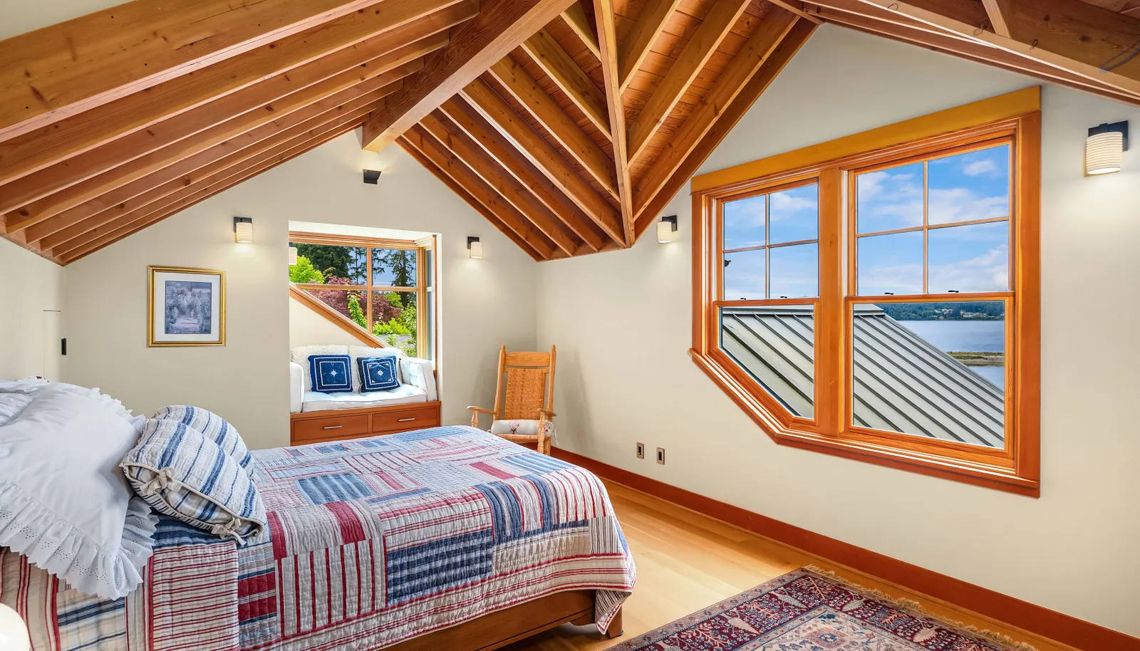 The upper west bedroom has a warm built in window seat 
