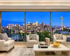 That perfect postcard of Seattle... The view that will never be obstructed and always take your breath away! Walls of windows simply bring in this iconic vista all along the southern wall of this home. From fireworks at New Years to the Blue Angels buzzing overhead in the summer to the daily back and forth of the ferries in Elliot Bay. THIS NEVER GETS OLD!