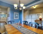 Formal dining room with easy access to the Chef's gourmet updated kitchen!