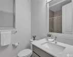 Main level three quarter bathroom/powder room.