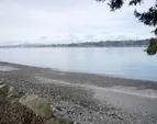 Your beach looking west, toward Bremerton. Navy vessels and WS ferries pass through here. Tidelands are included.