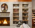 Beautiful built-ins surround the fireplaces for display of your coveted pieces.