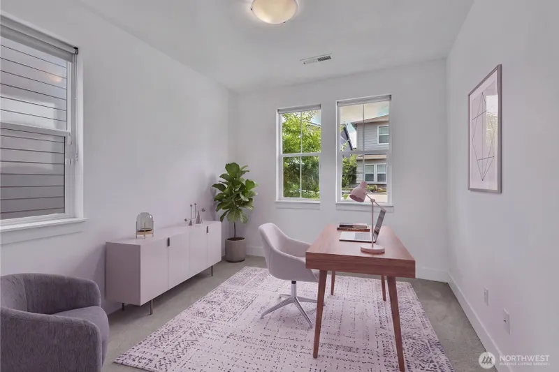 Main level bedroom is the perfect space for an office.