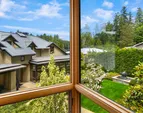 Looking from the studio over the garage, over the gardens to the main house. 
