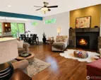relax in this open concept living room and kitchen and dining area