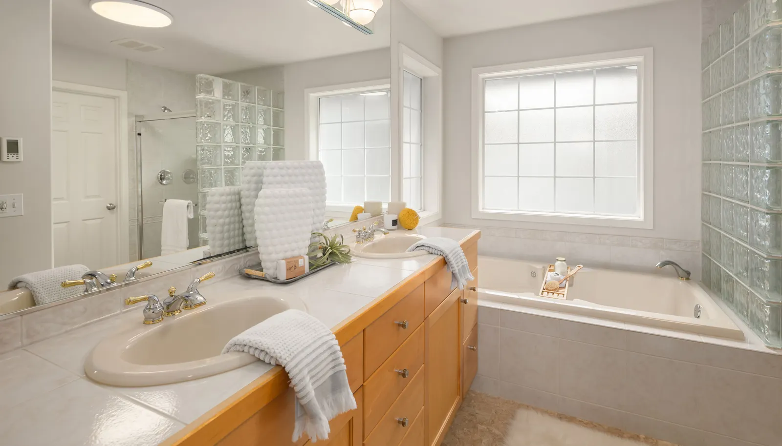 Primary bath with a large walk in closet.