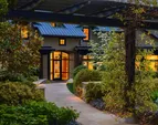 Set on .7+ acres with 110' of pristine, protected shoreline in coveted Fletcher Landing