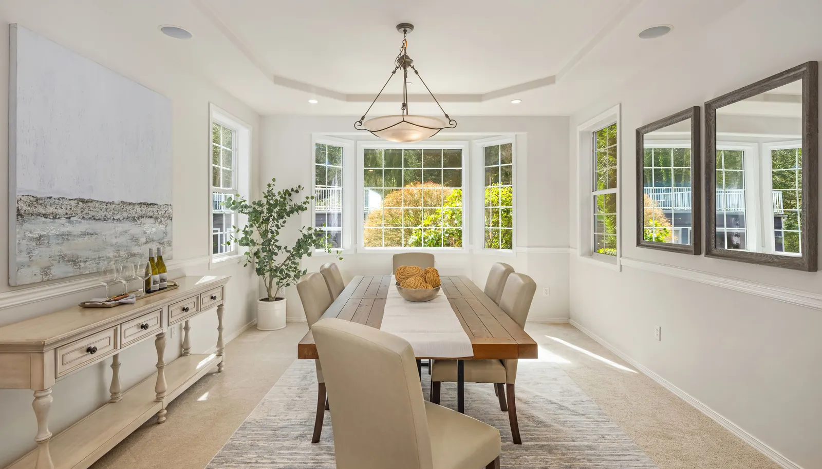 Formal dining room with a great view of the outdoors.