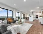 Showroom units Living room. Finishes vary by unit. Furniture not included in sale.
