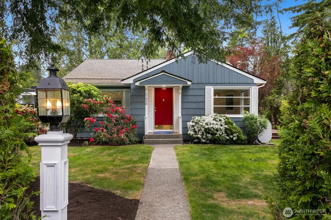 Darling 2 unit home is rentable while you design your dream home!