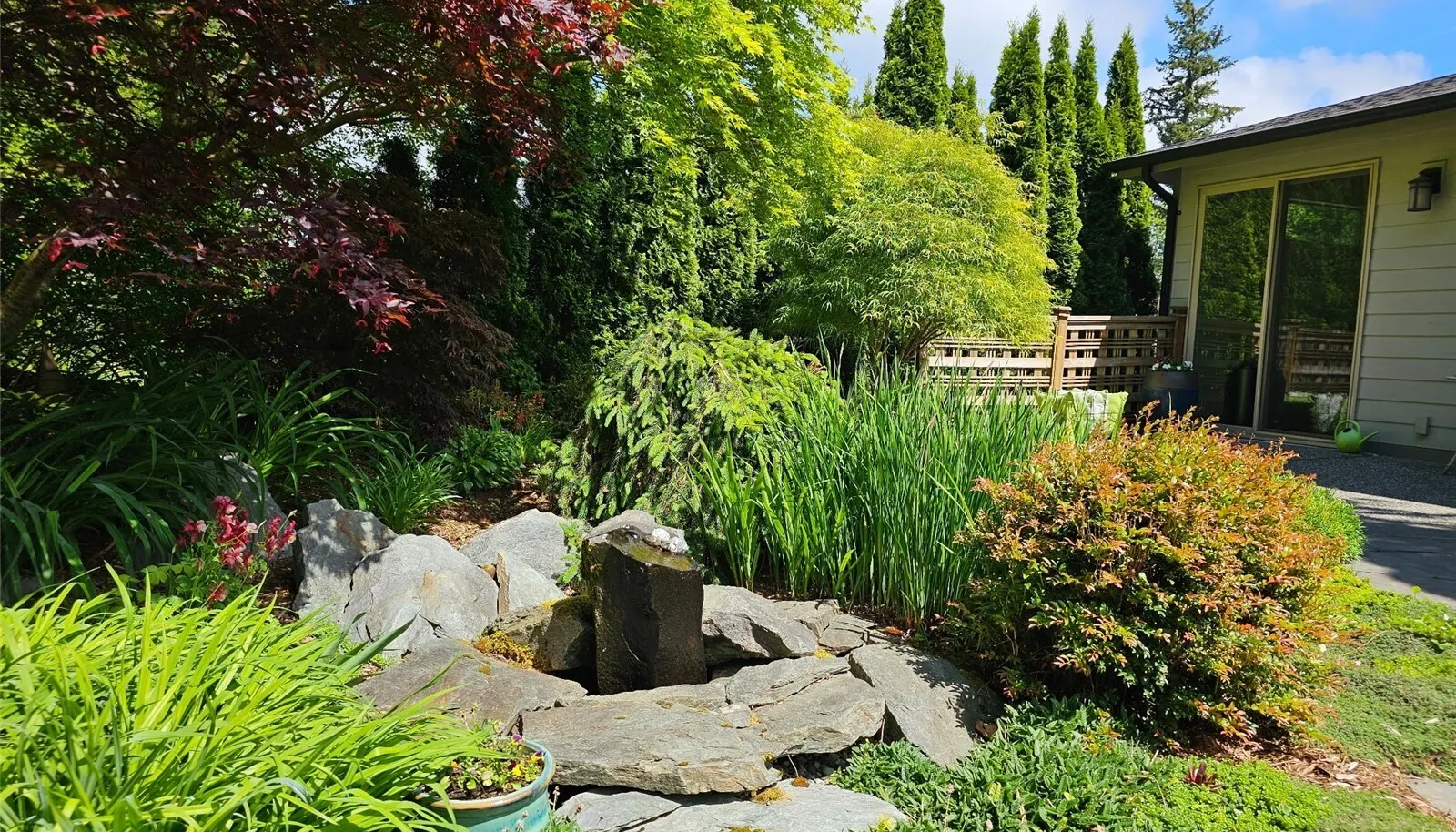Enjoy the serene water feature while relaxing