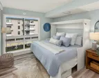 Bright and versatile secondary bedroom, ideal for use as a guest room, home office, or hobby space.