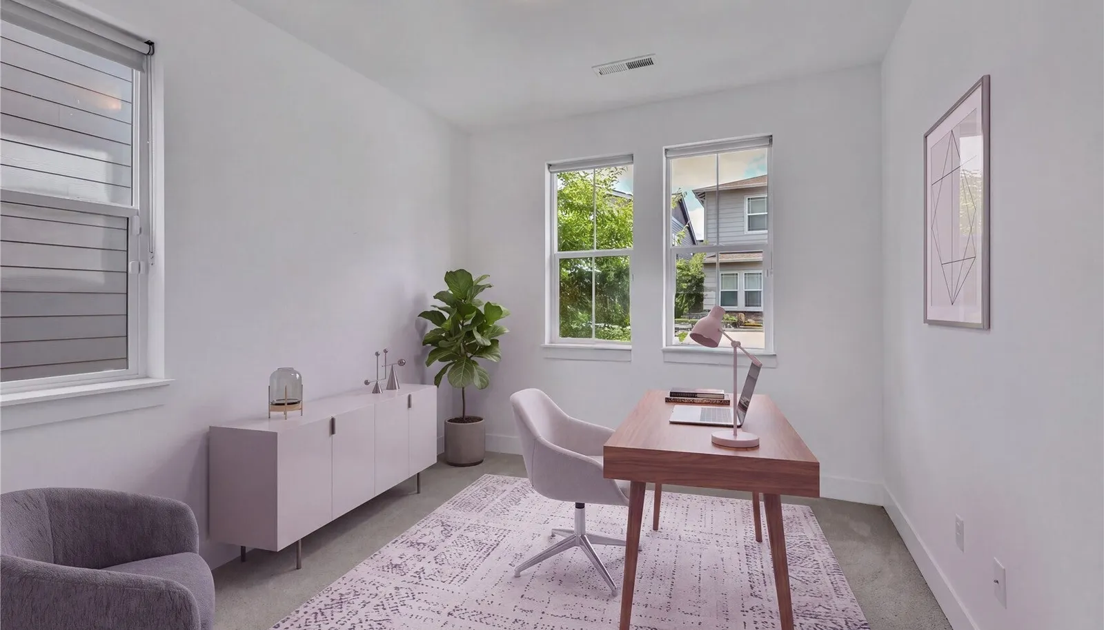 Main level bedroom is the perfect space for an office.