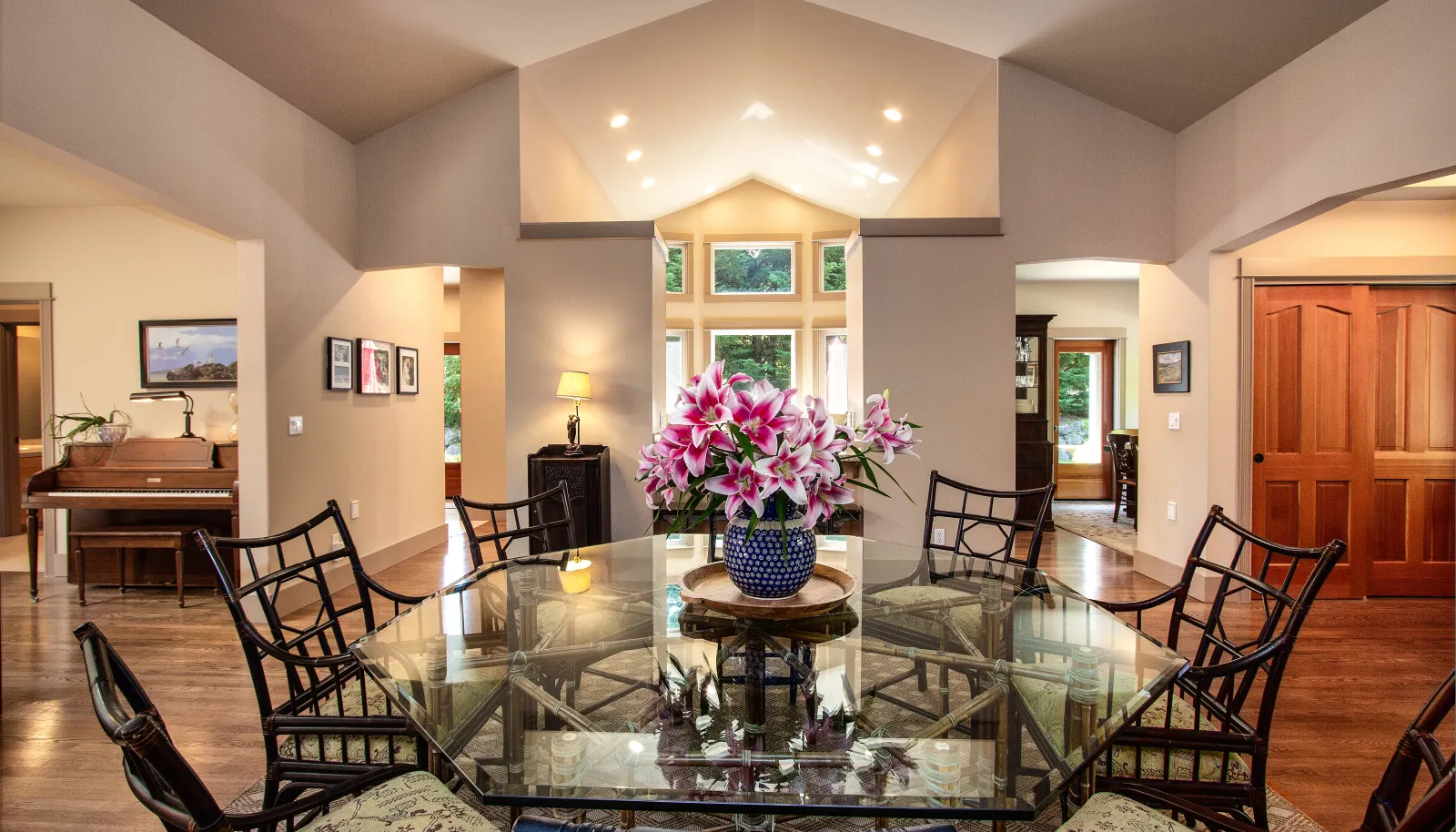 Looking from the dining area into the kitchen, the vaulted ceilings open the space.