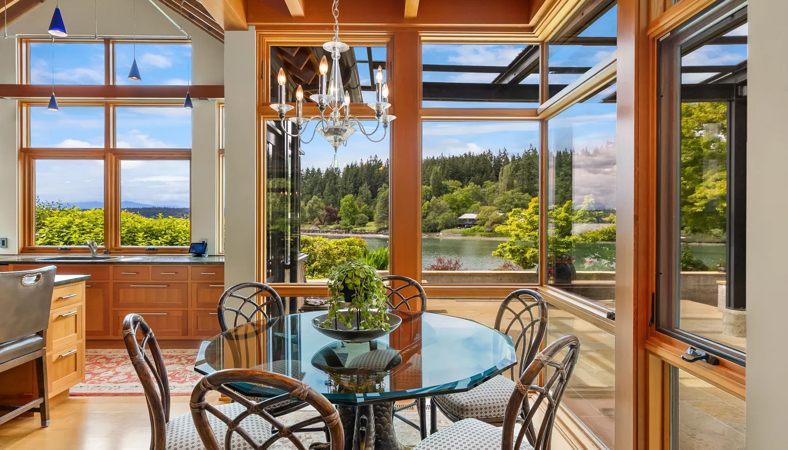 The waterside breakfast nook opens to the covered patio space