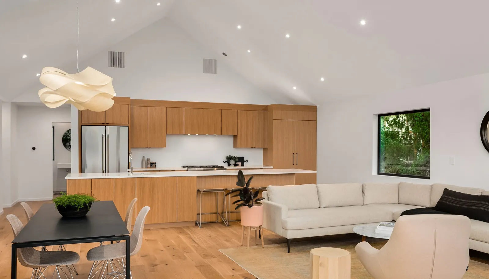 Custom white rift oak kitchen cabinets.