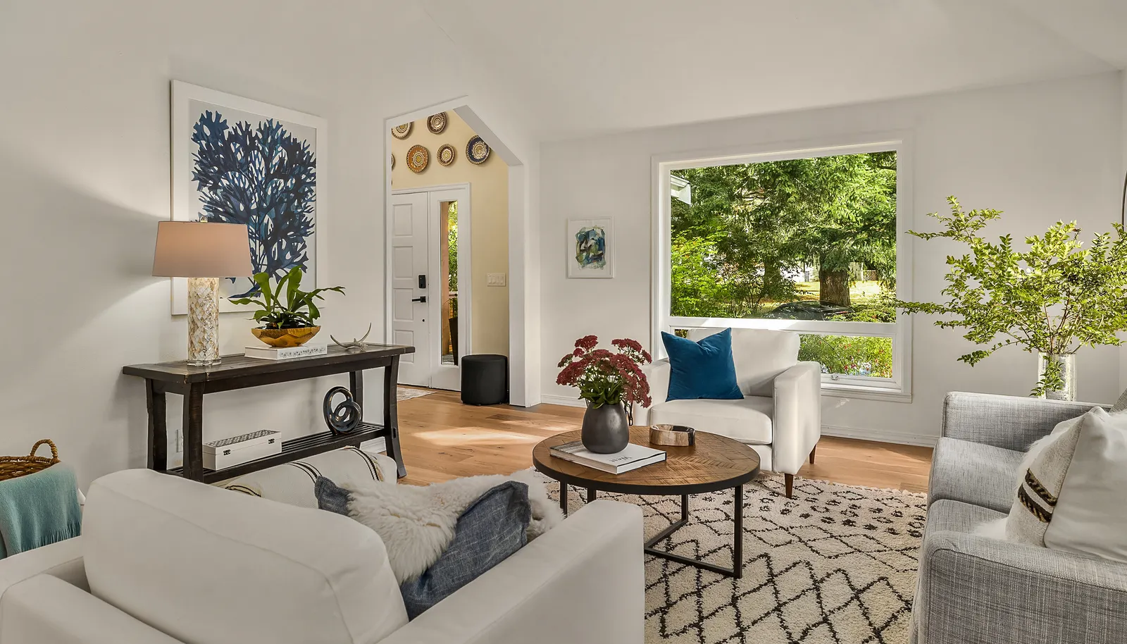 The living room has tons of natural light flowing in.