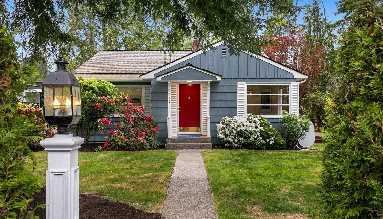 Darling 2 unit home is rentable while you design your dream home!