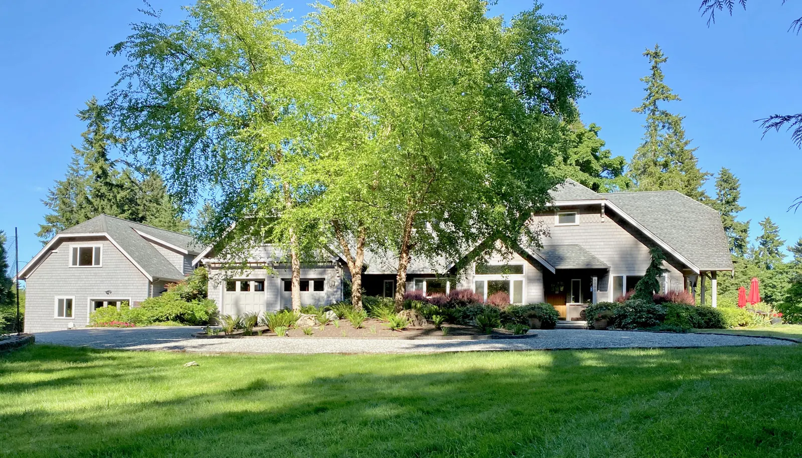 1.2+ acres: Manicured lawns, colorful gardens