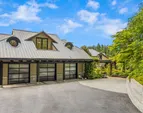 The three car detached garage provides plenty of parking and storage
