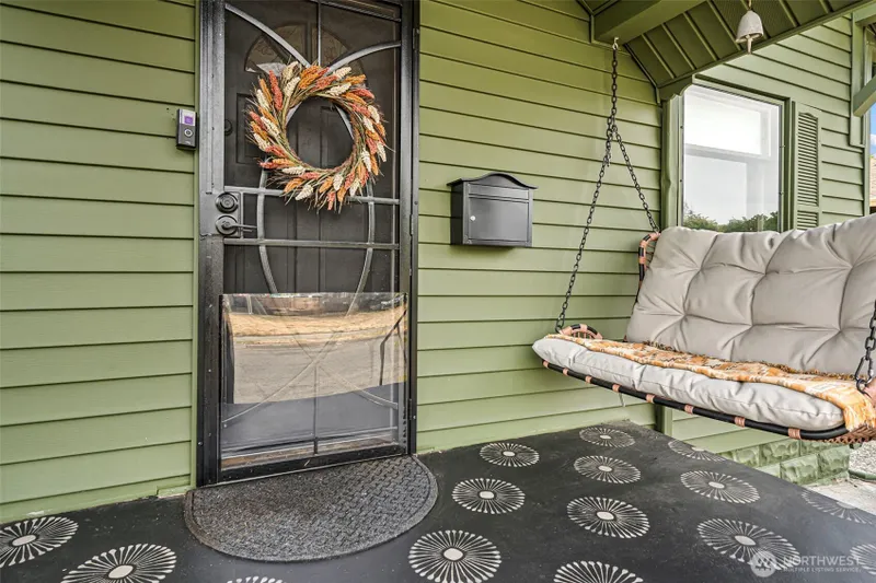 The front porch sets the tone from the moment you arrive, blending warmth, character, and curb appeal.
