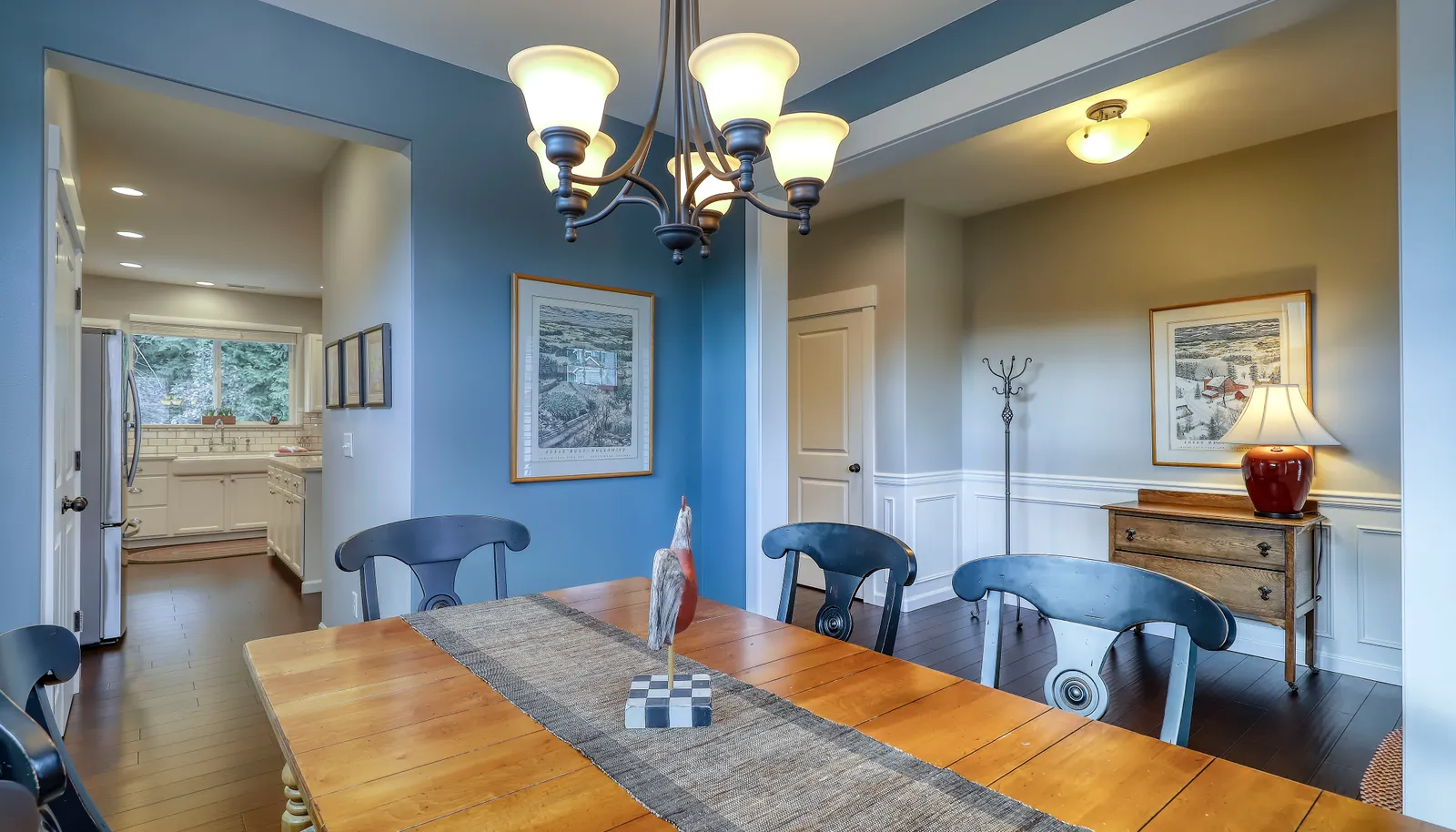 Formal dining room with easy access to the Chef's gourmet updated kitchen!