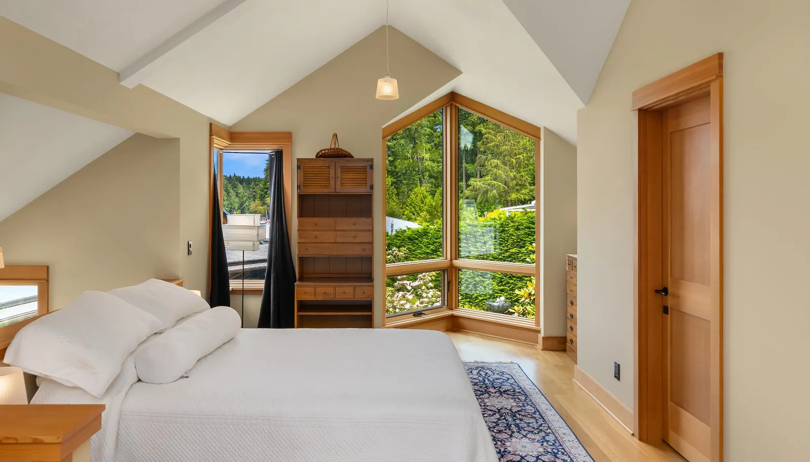 The studio over the garage is in keeping with the architectural design of the main house