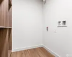Linen closet & laundry room.