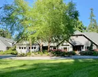 1.2+ acres: Manicured lawns, colorful gardens