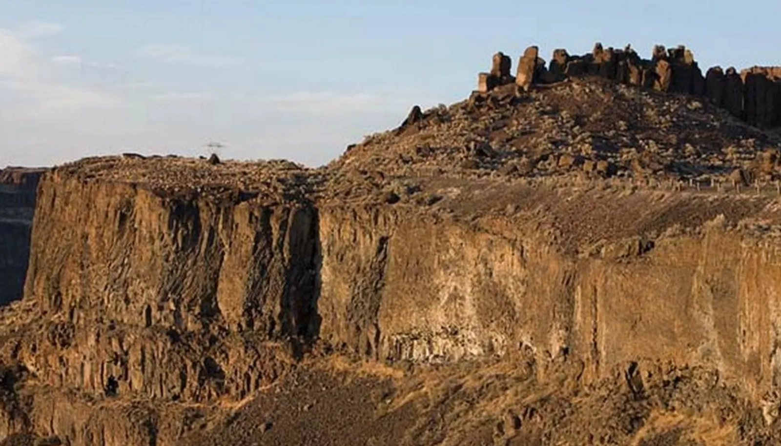 Stunning cliff vistas. 400 foot shear cliff walls to canyon floor below. Head of Frenchman Coulee has 50 developable acres. Equestrian trails exist from the highest ridges to the canyon floor below. Famous "FEATHERS" rock out-cropping shown in distance. Stunning cliff vistas. 400 foot shear cliff walls to canyon floor below. Head of Frenchman Coulee has 50 developable acres. Equestrian trails exist from the highest ridges to the canyon floor below. Famous "FEATHERS" rock out-cropping shown in distance.