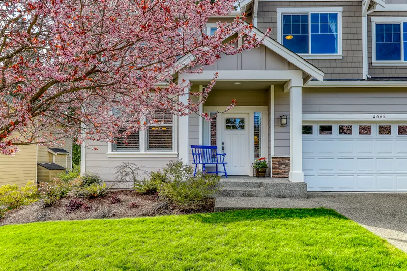 Approach to the covered  front porch.