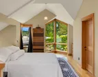 The studio over the garage is in keeping with the architectural design of the main house