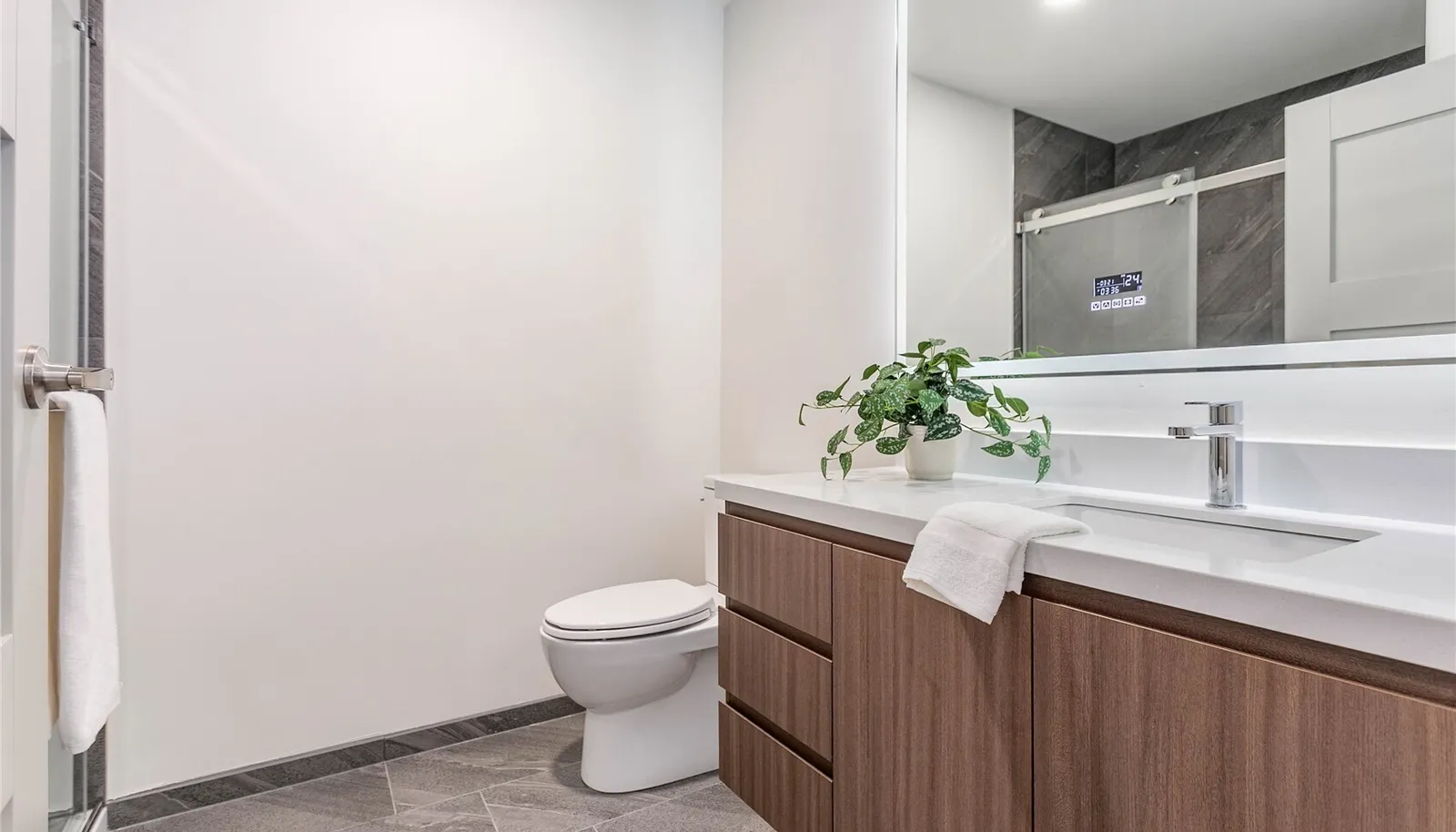 3/4 bathroom attached to third bedroom.