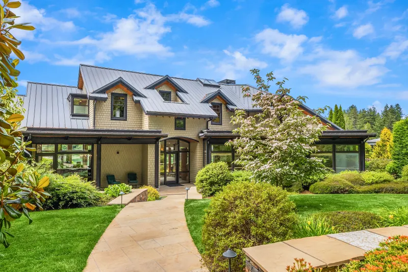 Lush gardens, stunning architecture and expertly executed construction ground the home 