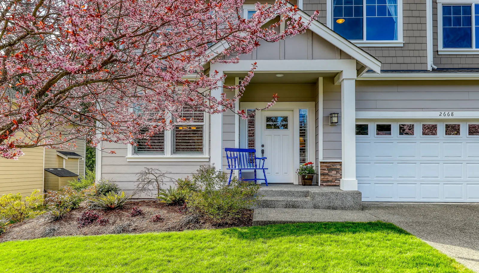 Approach to the covered  front porch.