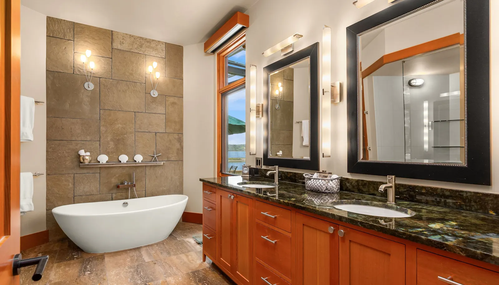 The primary bath with large soaking tub, oversized shower and of course, heated floors!