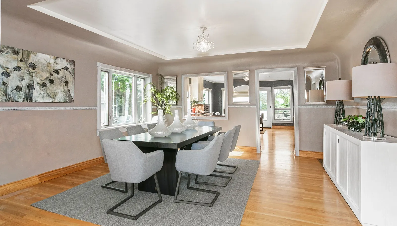 Dining room with kitchen beyond. Dining room with kitchen beyond.