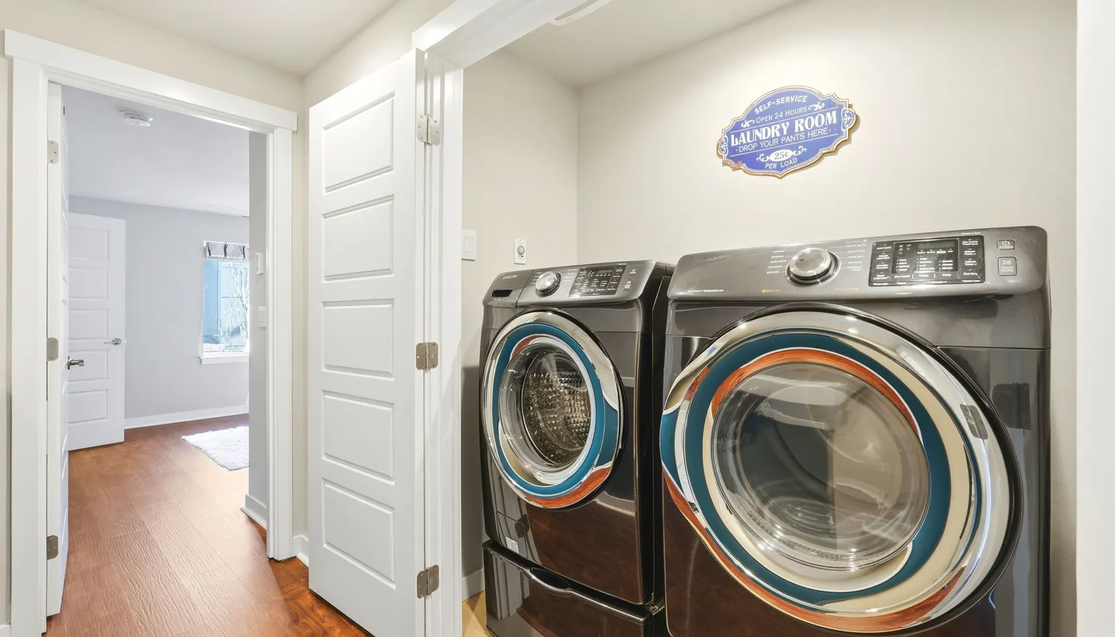 Hidden in a closet are the full-size high-end washer and dryer.