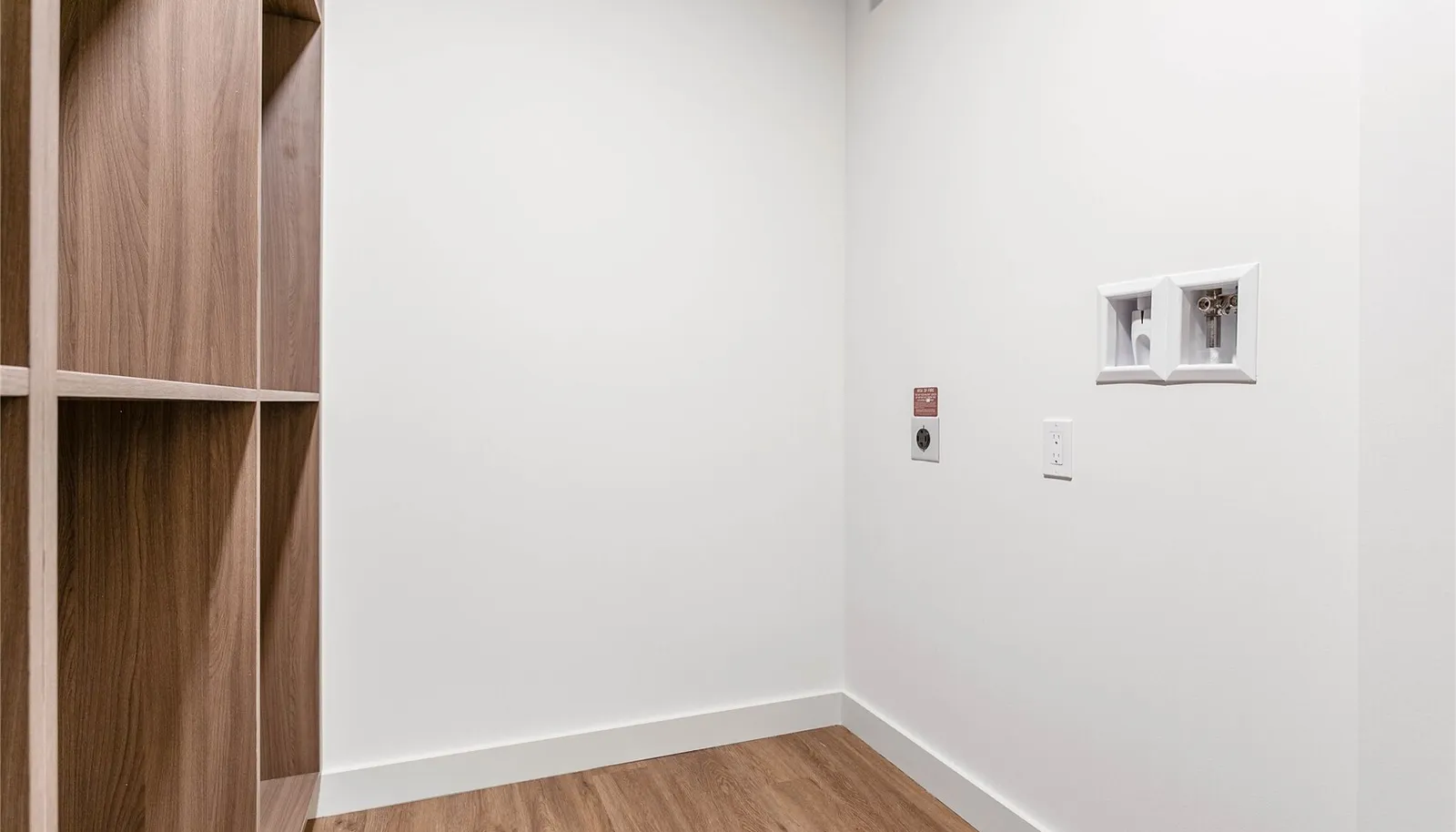 Linen closet & laundry room.