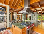 High end appliances and a large island with seating. 