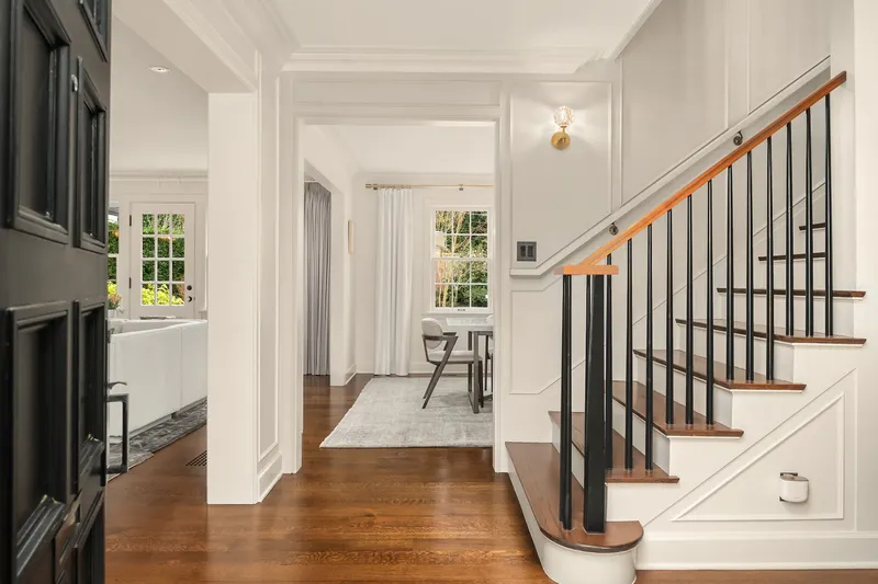 Straight ahead the dining room, the living room is to the left.