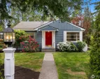 Darling 2 unit home is rentable while you design your dream home!