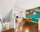 Custom accent walls and designer finishes elevate everyday living.