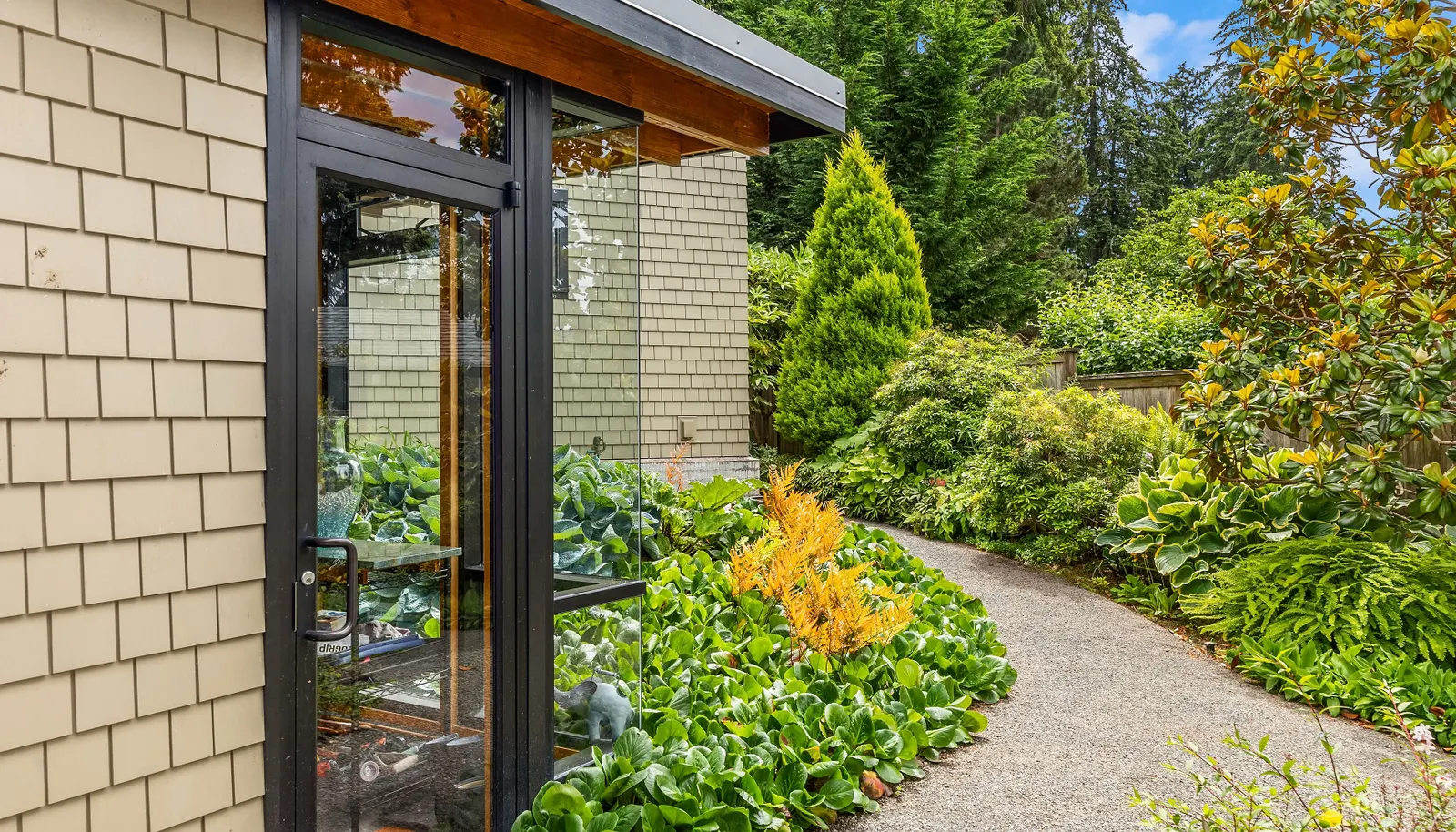The greenhouse is fully plumbed and integrated into the landscape. 