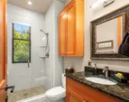 The en-suite bath of the upper east bedroom