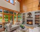 Light floods the spaces while warm wood finishes create a sense of connectedness to the Pacific Northwest