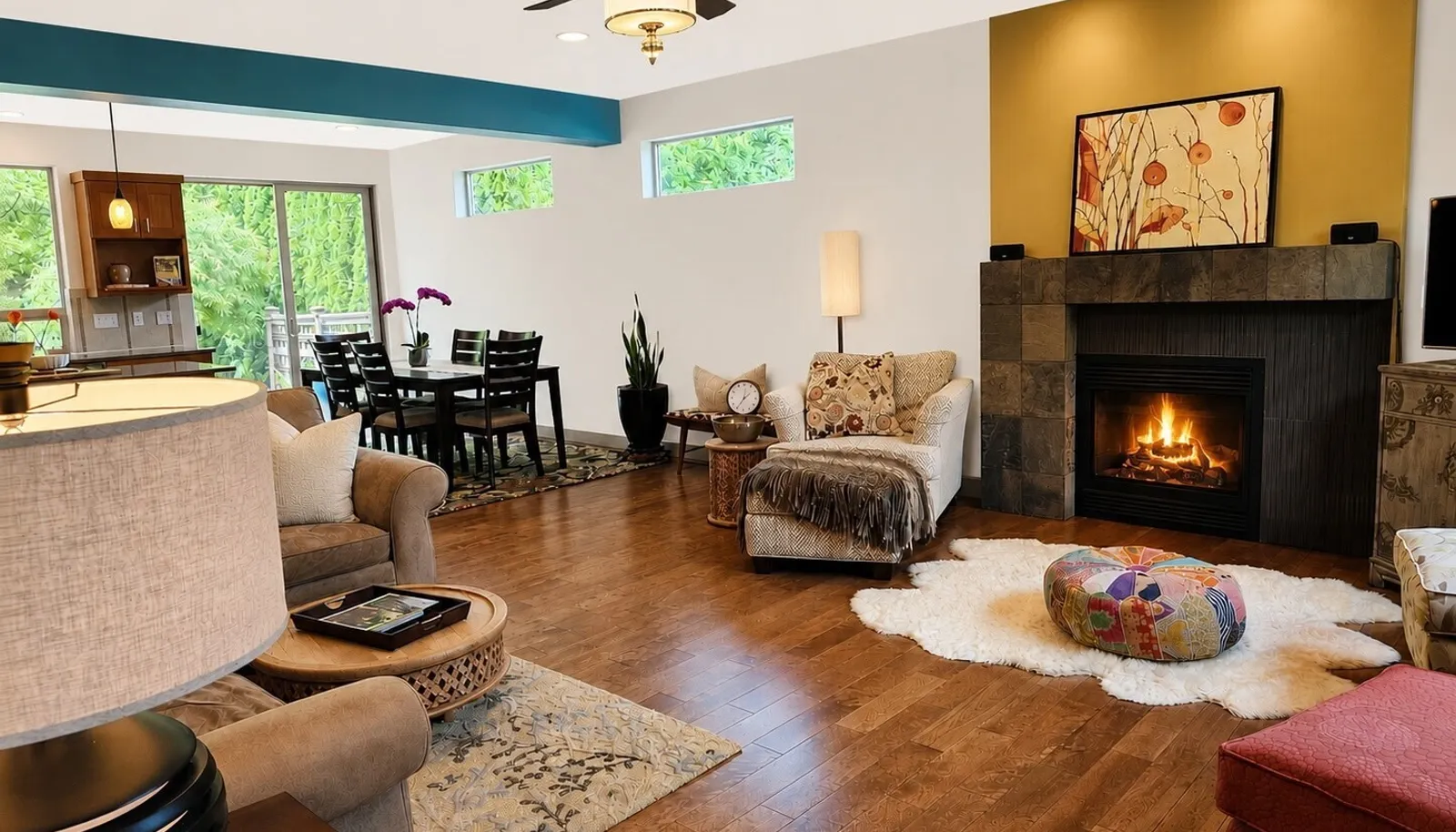 relax in this open concept living room and kitchen and dining area