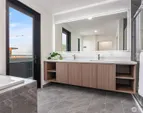 Showroom Secondary Bedroom. Finishes vary by unit. Furniture not included in sale.