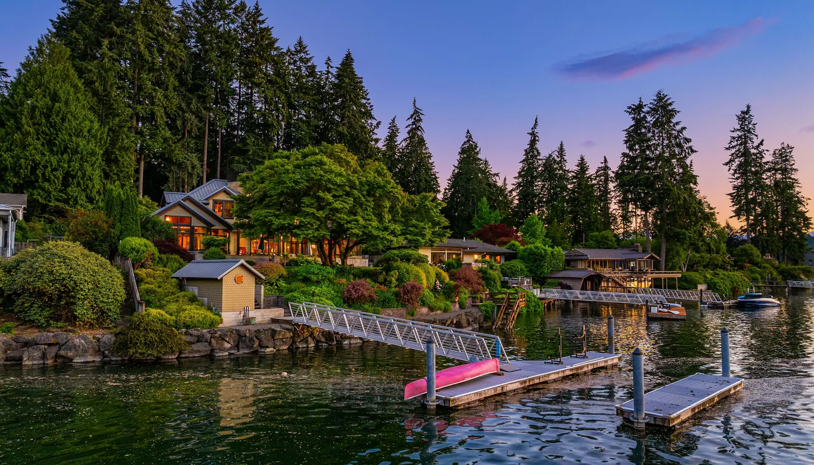 The boat house to the left and the dock in front make life on the water a playground! Kayaking, paddle boarding, sailing and tubing. Summer fun awaits!