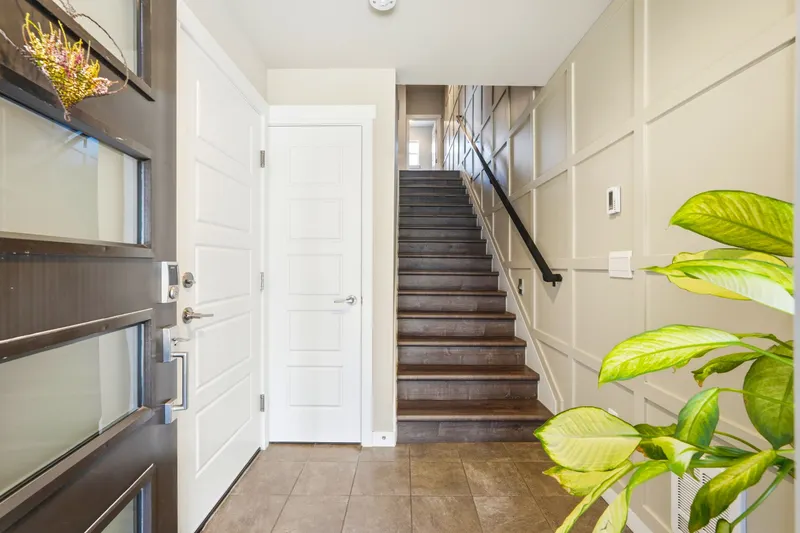 The inviting entry is enhanced with elegant board-and-batten detailing for a refined welcome.
